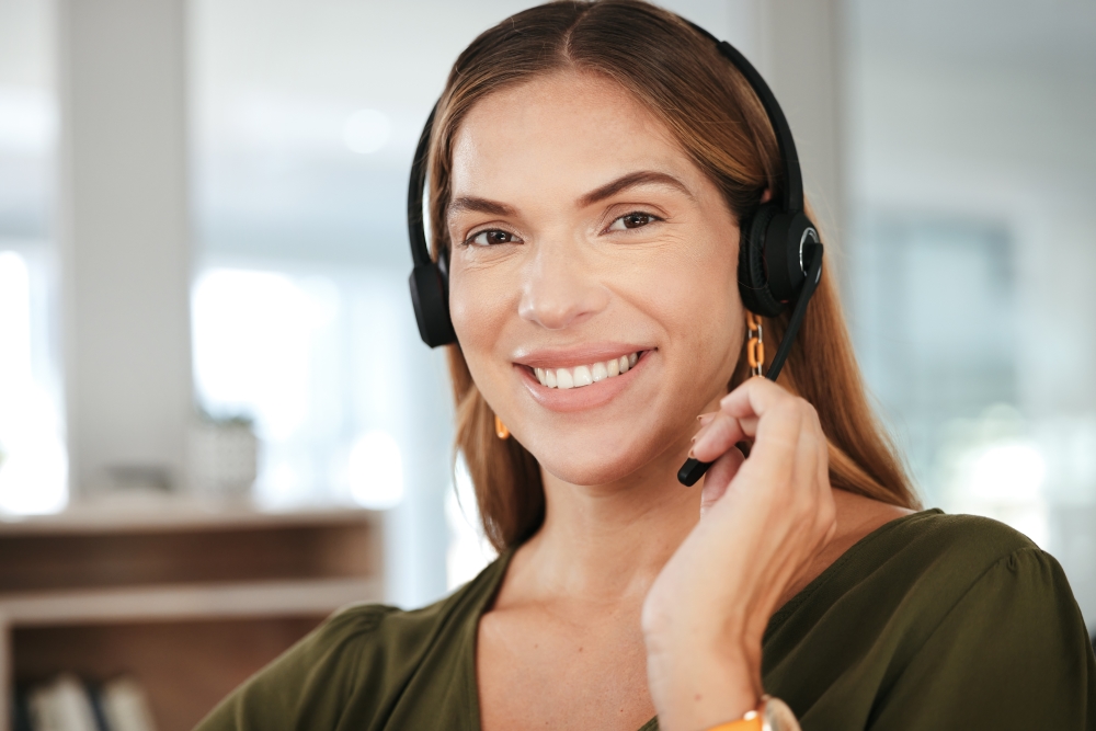 Woman Wearing a Heaset and Smiling